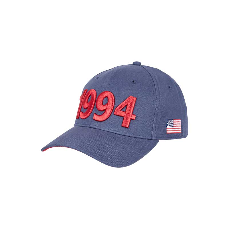 Denim cap with a curved brim, the 1994 year in red in the front & the American flag on the left side, reminiscing the 1994 FWC in the USA.