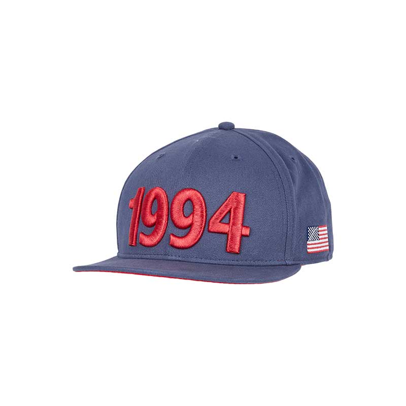 Denim cap with a curved brim, the 1994 year in red in the front & the American flag on the left side, reminiscing the 1994 FWC in the USA.