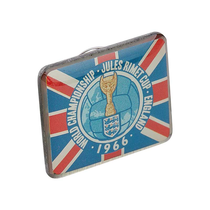 Pin in red, white, and blue, with the National Flag of the United Kingdom, honoring England's victory during the FIFA World Cup in 1966.