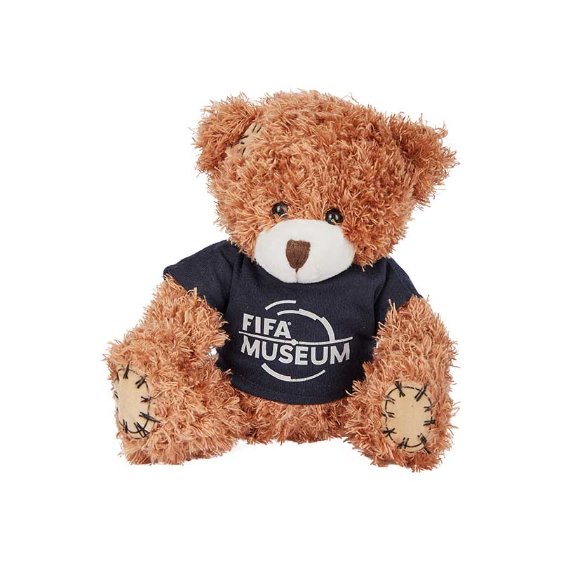 A Plush Teddy Bear which comes with a cute little dark blue T-Shirt featuring the FIFA Museum Trademark. A Perfect Gift for your loved ones.