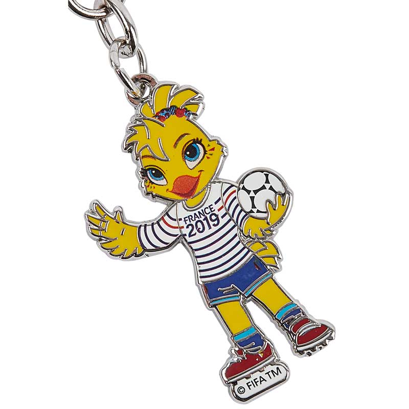 A metal keyring of the FIFA World Cup Mascot wearing a France 2019 striped T-shirt and holding a football.