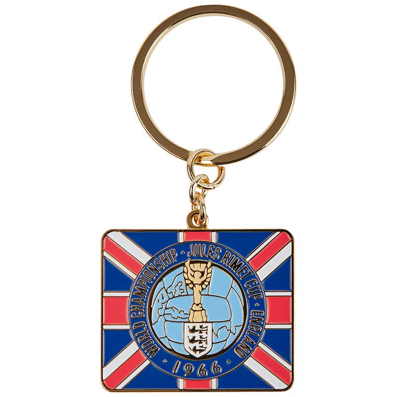 A keyring from the FIFA World Cup Championship that took place in England in 1966 with the winning trophy displayed in the center.