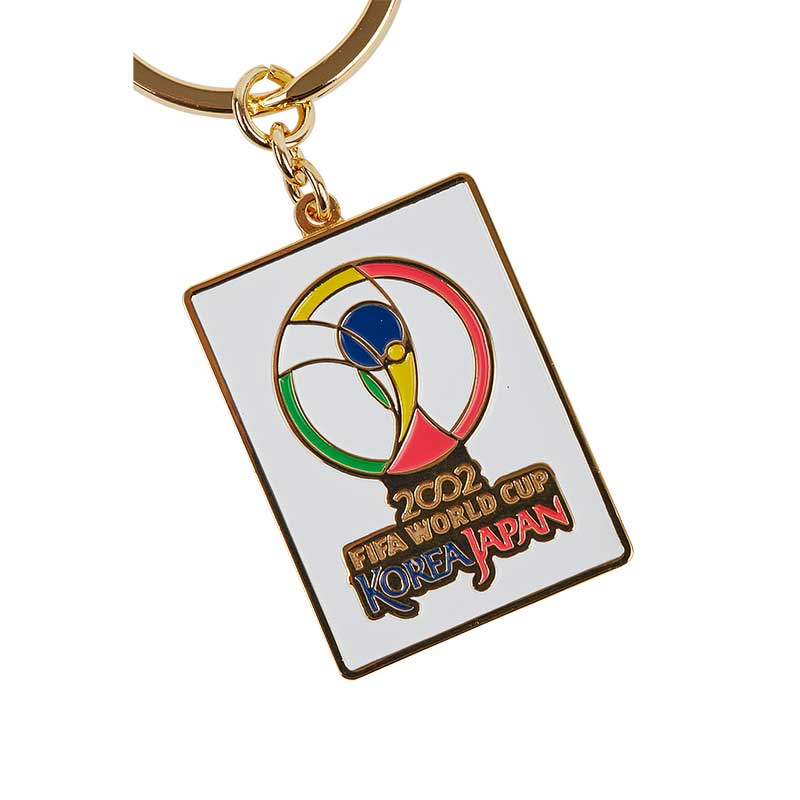 A rectangular white Keyring showing the 2002 South Korea and Japan FIFA World Cup Championship with the tournament logo displayed.