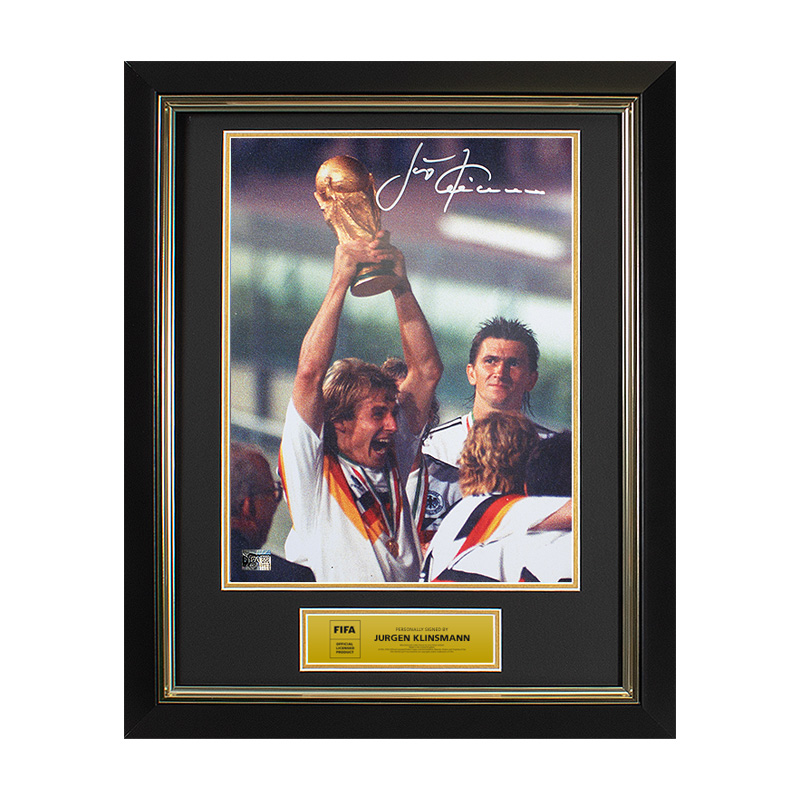 Official FIFA World Cup Framed Photo depicting Germany's victory in 1990, personally signed by the legend Jurgen Klinsmann.